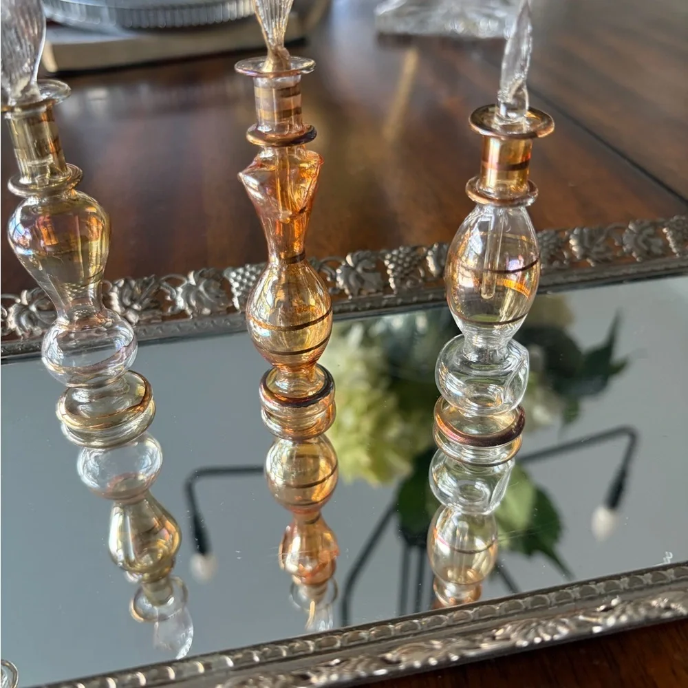 Elegant Egyptian perfumeGlass bottles and vintage trey